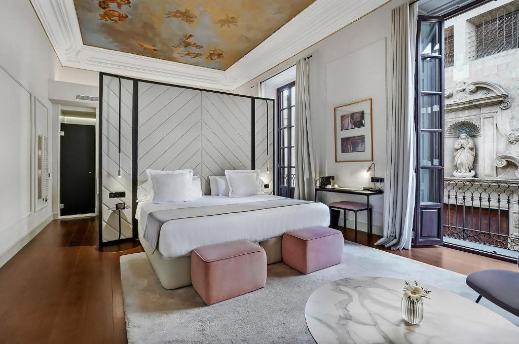 Posteľ alebo postele v izbe v ubytovaní Summum Boutique Hotel, member of Meliá Collection
