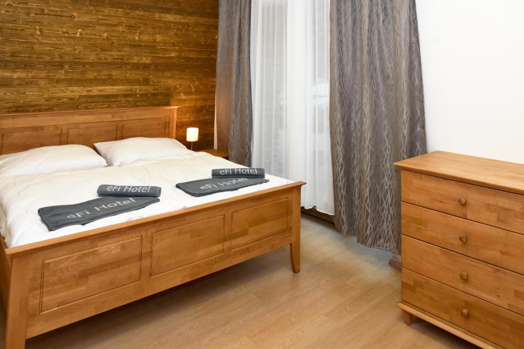 Voodi või voodid majutusasutuse EFI ApartHotel Horní Lipová toas