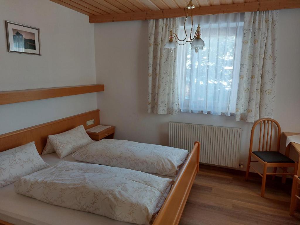 Giường trong phòng chung tại Reinprecht