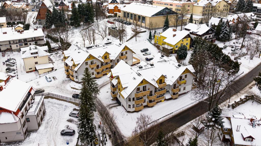 an aerial view of a city with snow covered buildings at Wonder Home - Apartamenty położone blisko deptaka, licznych restauracji i sklepów in Karpacz