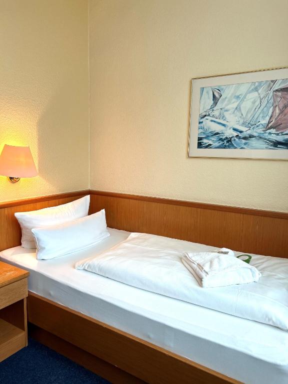 Postel nebo postele na pokoji v ubytování Sure Hotel by Best Western Wilhelmshaven City