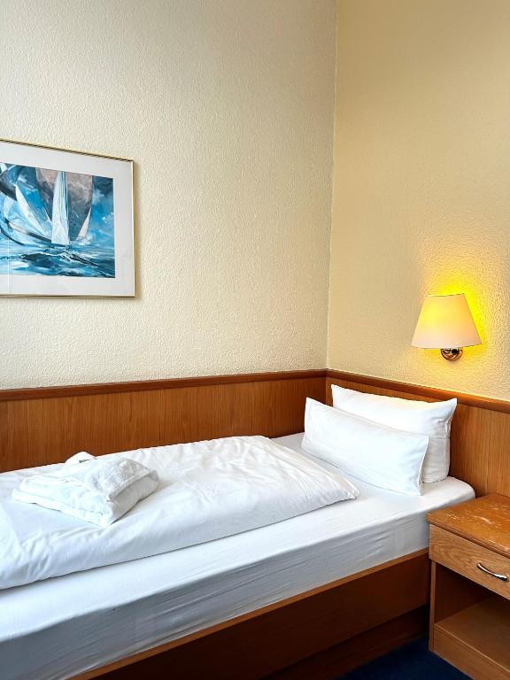 Postel nebo postele na pokoji v ubytování Sure Hotel by Best Western Wilhelmshaven City