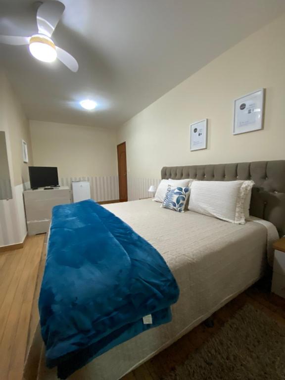 En eller flere senge i et værelse på POUSADA E RESTAURANTE CASA PRIMITIVUS