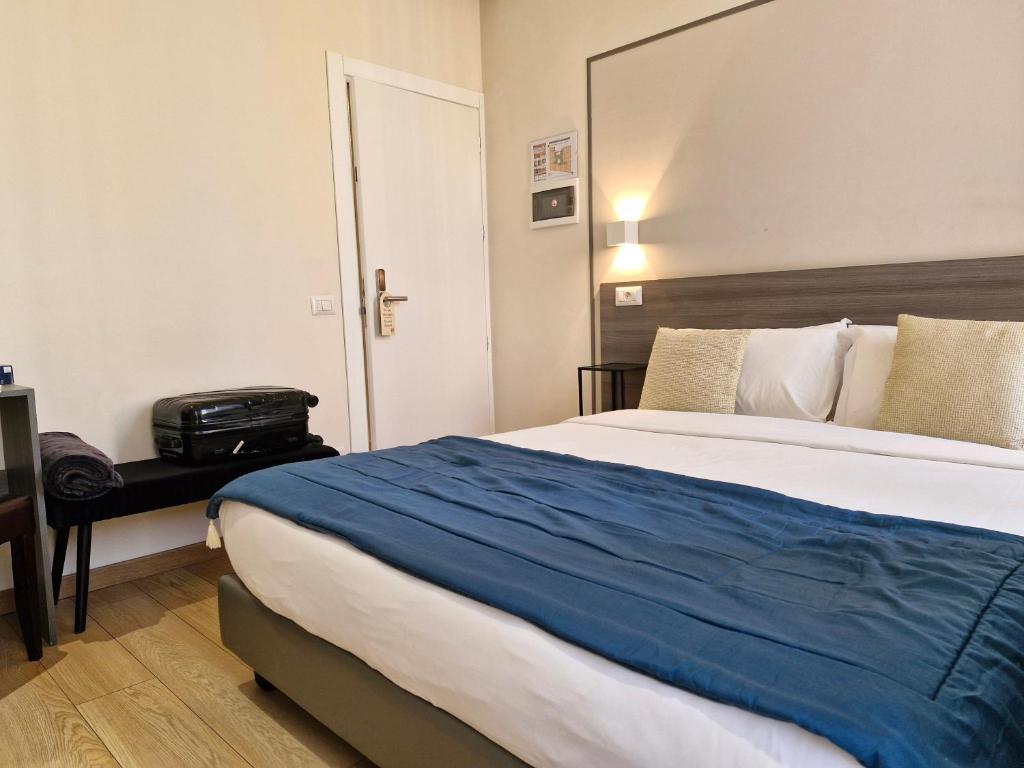 Postel nebo postele na pokoji v ubytování Boutique Hôtel Neptune Nice