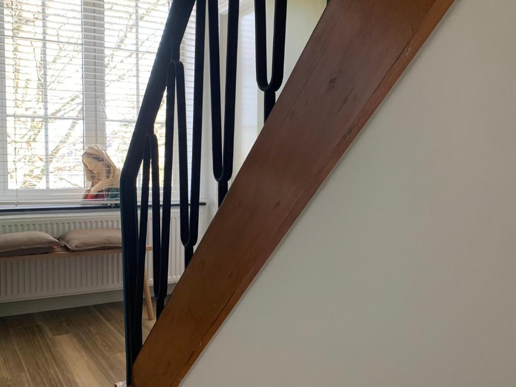 Postel nebo postele na pokoji v ubytování Hotel Au Nom De Dieu
