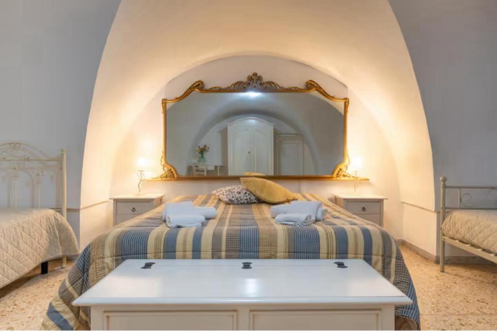 En eller flere senge i et værelse på La casa dei nonni