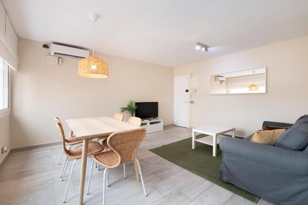 Televízia a/alebo spoločenská miestnosť v ubytovaní White Sea by Seasidehomes