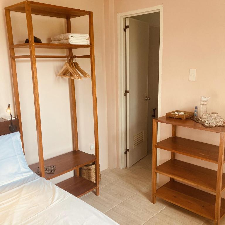 Postel nebo postele na pokoji v ubytování The Lazy Tiki