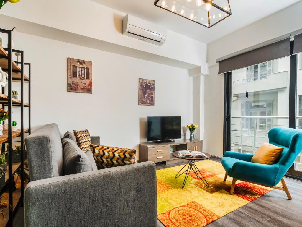 A television and/or entertainment centre at Kula apartments City center Exarchia