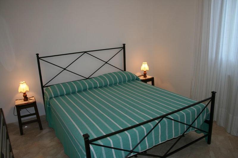 מיטה או מיטות בחדר ב-Cav Costa degli Etruschi