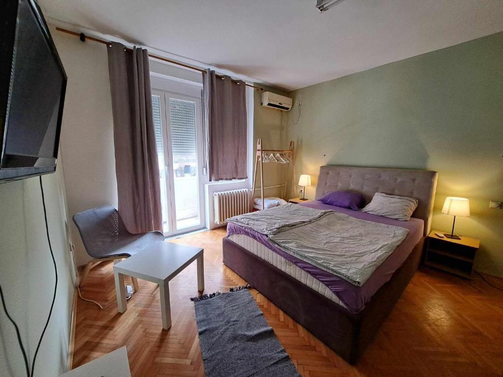 Postel nebo postele na pokoji v ubytování Central Station Private Rooms