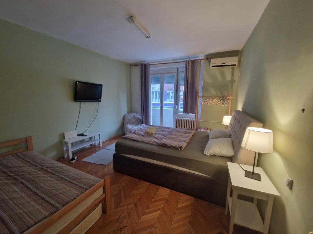 Postel nebo postele na pokoji v ubytování Central Station Private Rooms