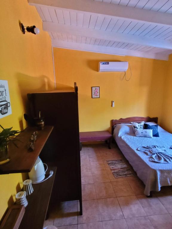 Postel nebo postele na pokoji v ubytování Ombú Guests House