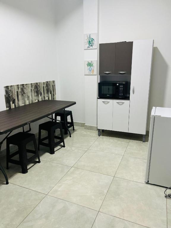 Kuchyň nebo kuchyňský kout v ubytování CASA SHILCAYO Habitaciones Vacacionales