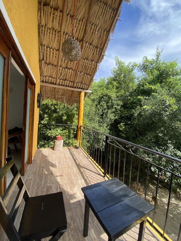 Balkón nebo terasa v ubytování Xkopek, Camping y Cabañas
