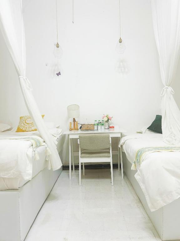 SYRI Boutique Guesthouse Restaurant & Cafe - Habitación Queen Con Dos Camas Queen