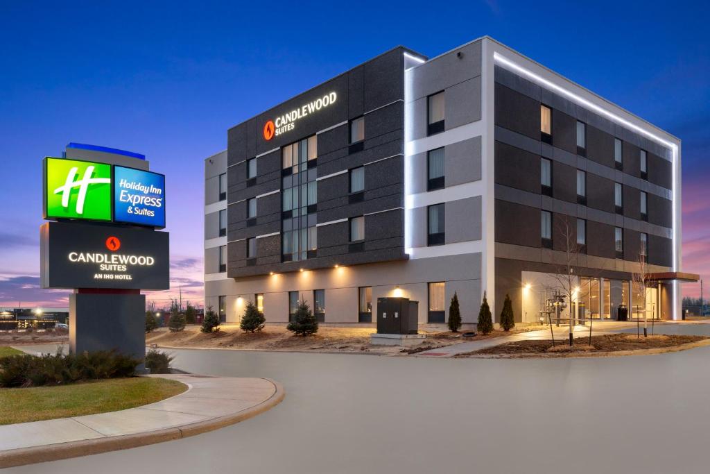 a hotel building with a sign in front of it at Candlewood Suites Collingwood, an IHG Hotel in Collingwood