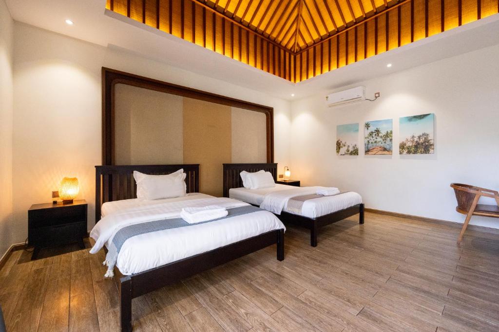 Postel nebo postele na pokoji v ubytování Ream YoHo Resort