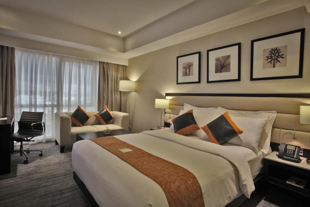 Limketkai Luxe Hotel - Верхняя королева комната