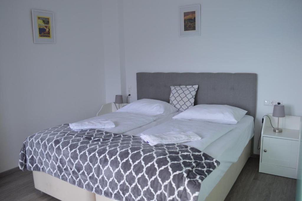 Postel nebo postele na pokoji v ubytování Jaeger Guesthouse