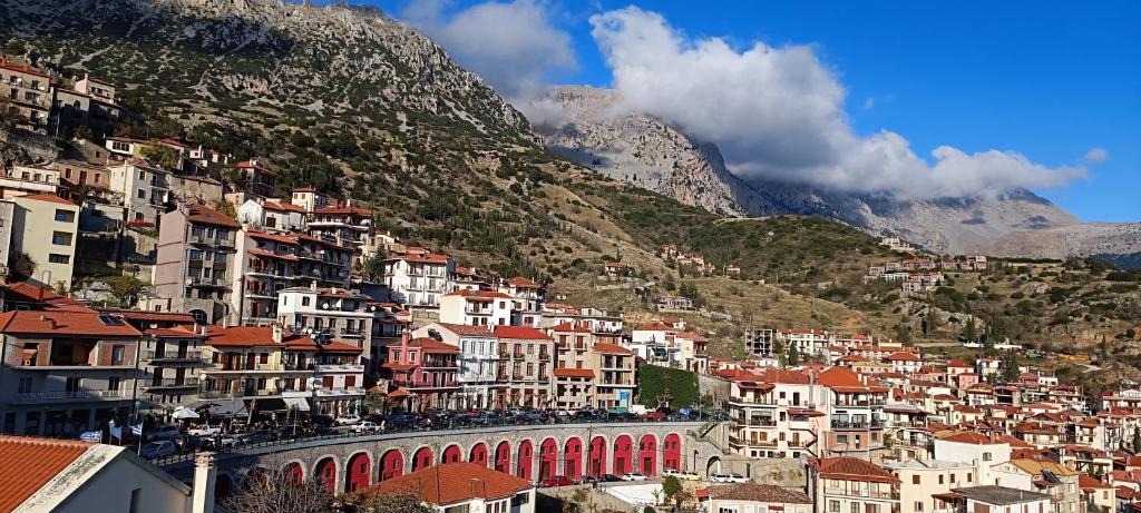 a bunch of houses on a mountain with a bridge at Orechova - orech+ova in Arachova