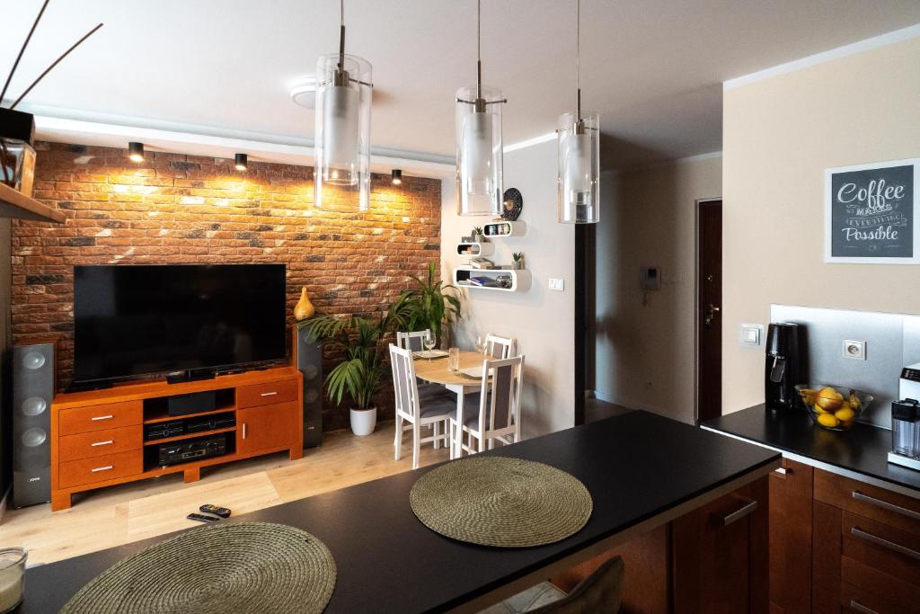 Η κουζίνα ή μικρή κουζίνα στο Verona Apartament 115, 69m2, Terrace, Garage