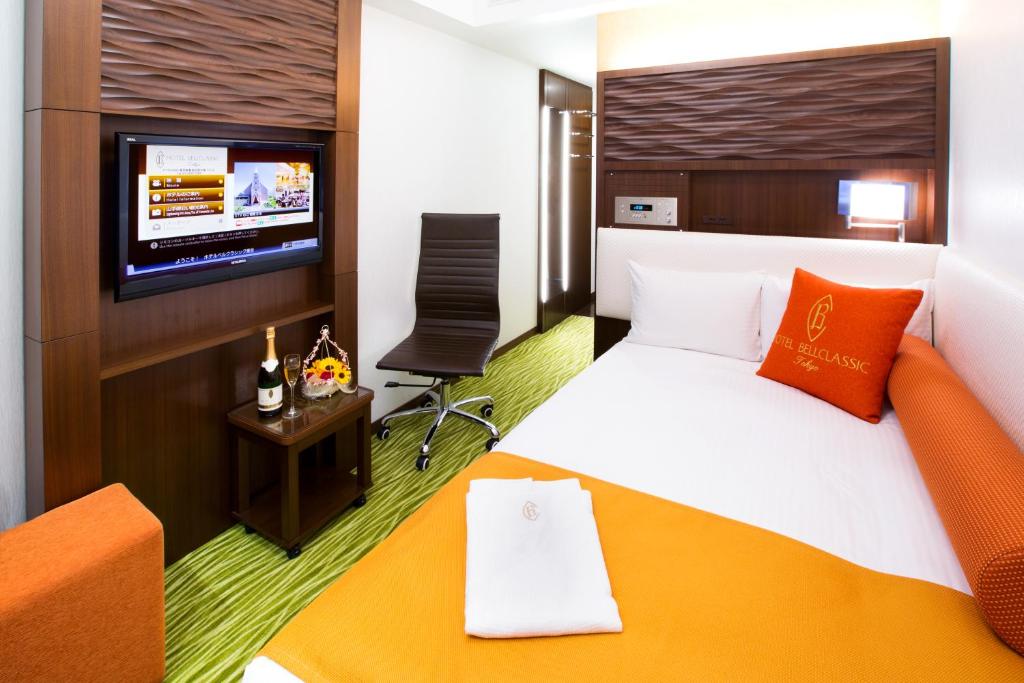 Postel nebo postele na pokoji v ubytování Hotel Bellclassic Tokyo