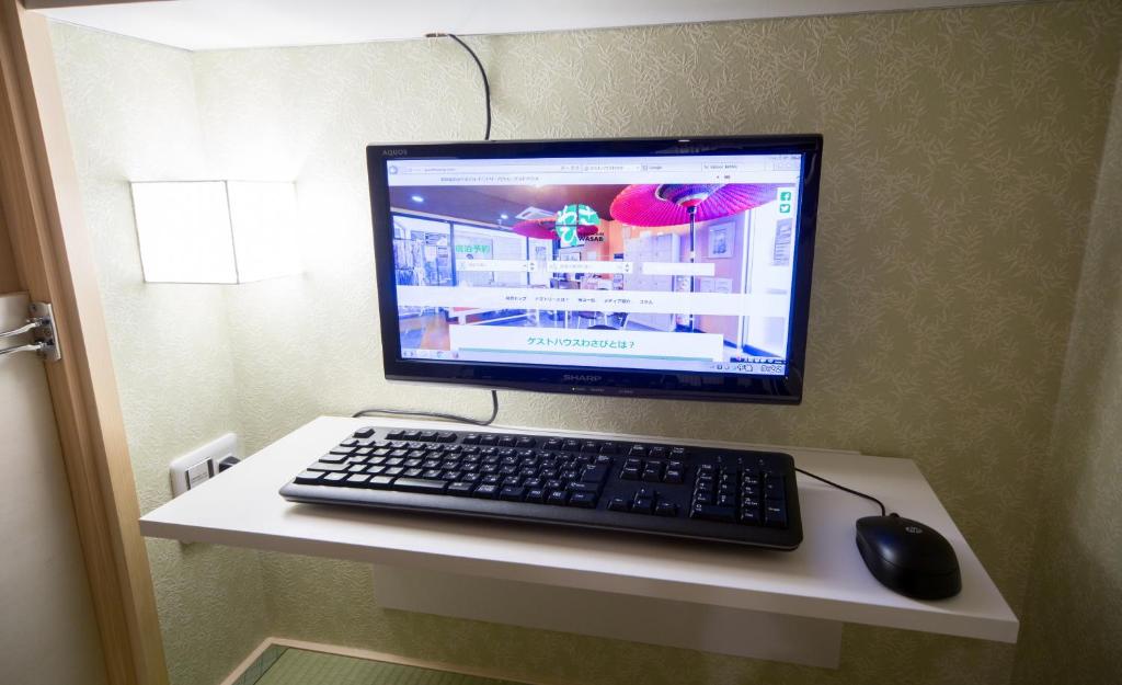 TV a/nebo společenská místnost v ubytování HOSTEL WASABI Nagoya Ekimae