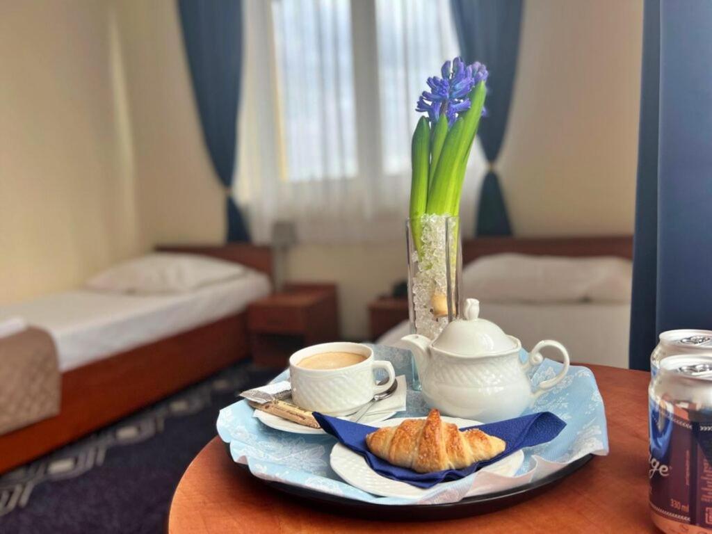 Łóżko lub łóżka w pokoju w obiekcie Hotel Vistula