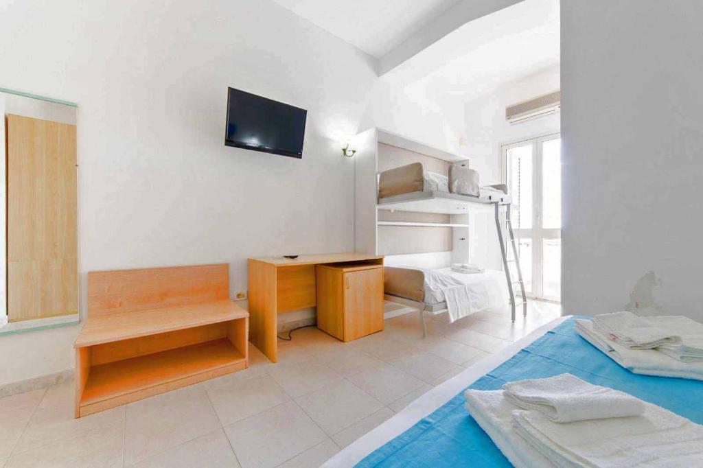 Postel nebo postele na pokoji v ubytování Picchio Hotel Pescoluse