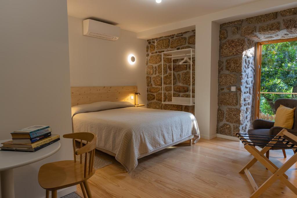 Postel nebo postele na pokoji v ubytování Quinta Do Crestelo Aparthotel