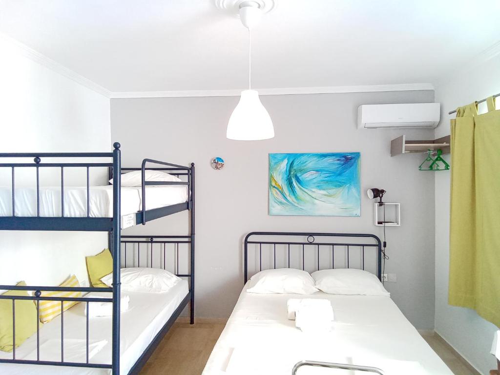 Vuode tai vuoteita majoituspaikassa Sunloft-Paros