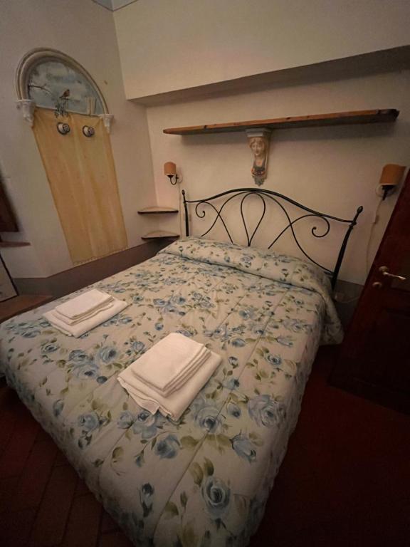 Postel nebo postele na pokoji v ubytování B&B Camere La Vite