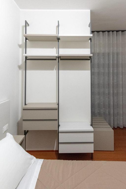 Postel nebo postele na pokoji v ubytování B&B Il Mercantello