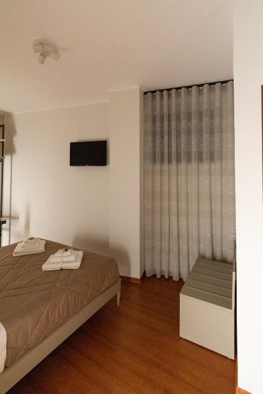 Postel nebo postele na pokoji v ubytování B&B Il Mercantello
