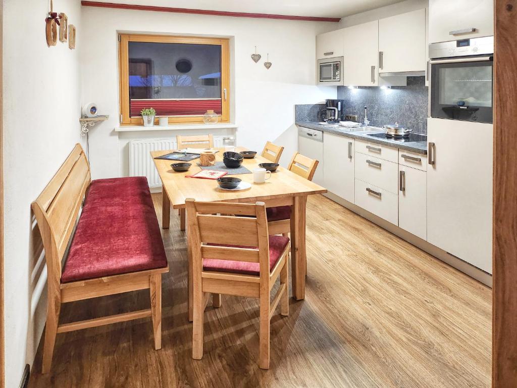 Kuchyň nebo kuchyňský kout v ubytování Appartements & Chalets Wiesenruh