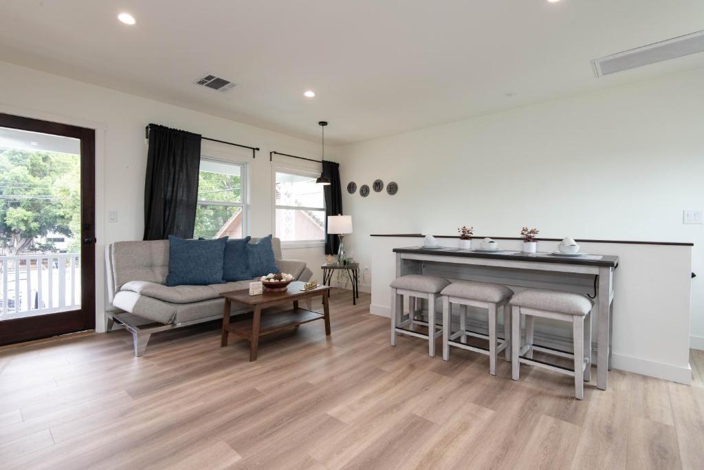 a living room with a couch and a table at Cozy Apartment in Atwater Village in Glendale