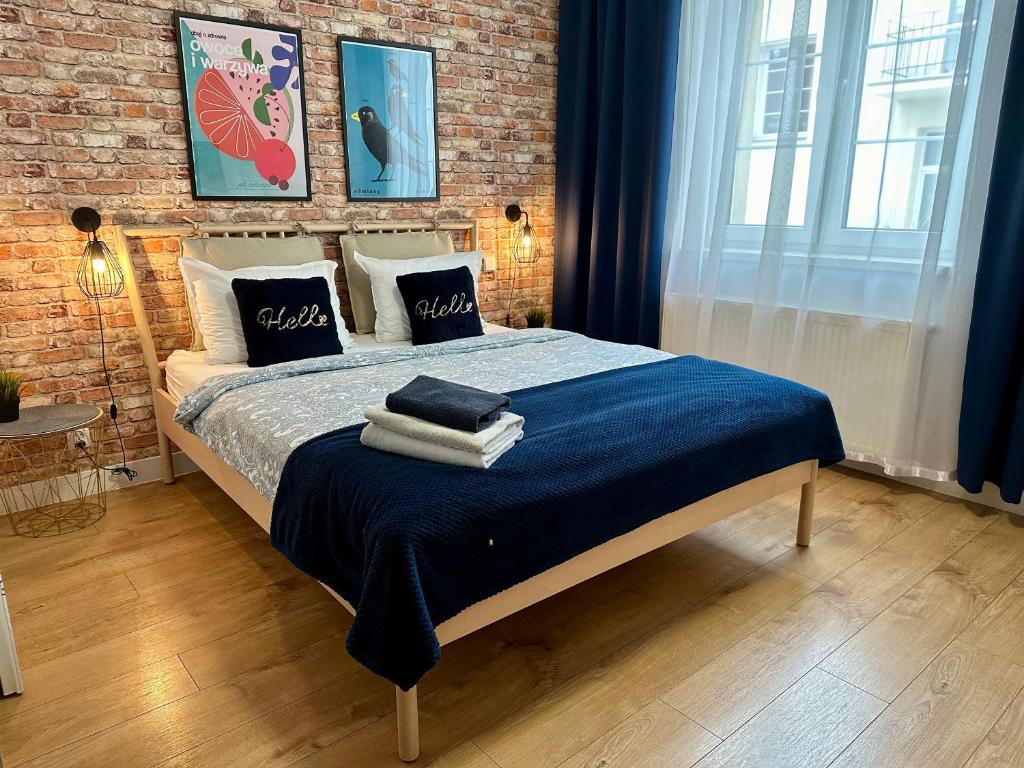Posteľ alebo postele v izbe v ubytovaní Smile Apartments Center Kraków Old Town