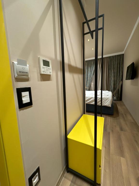 Postel nebo postele na pokoji v ubytování Hotel Gjika