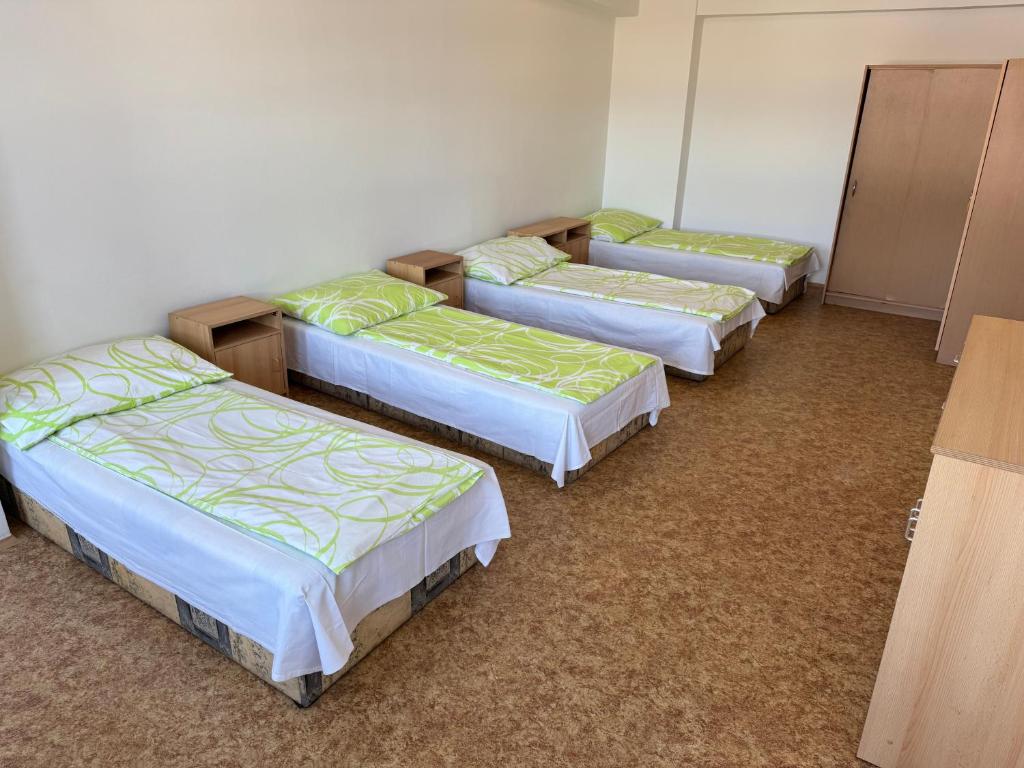Postel nebo postele na pokoji v ubytování D8 APARTMÁNY