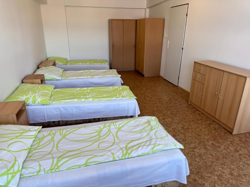 Postel nebo postele na pokoji v ubytování D8 APARTMÁNY