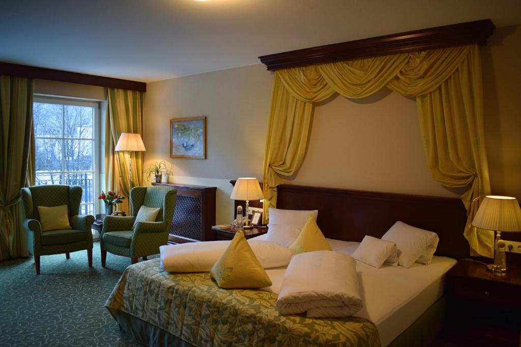 Posteľ alebo postele v izbe v ubytovaní Grandhotel Lienz Business-Wellness & Gourmet
