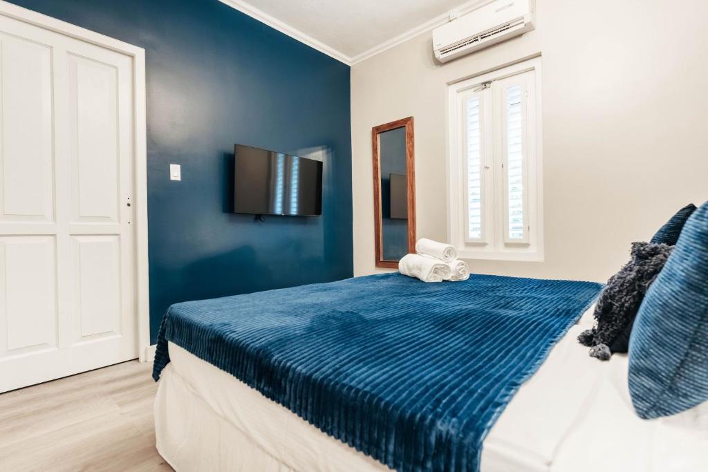 Postel nebo postele na pokoji v ubytování Atelier Skalo Boutique Hotel