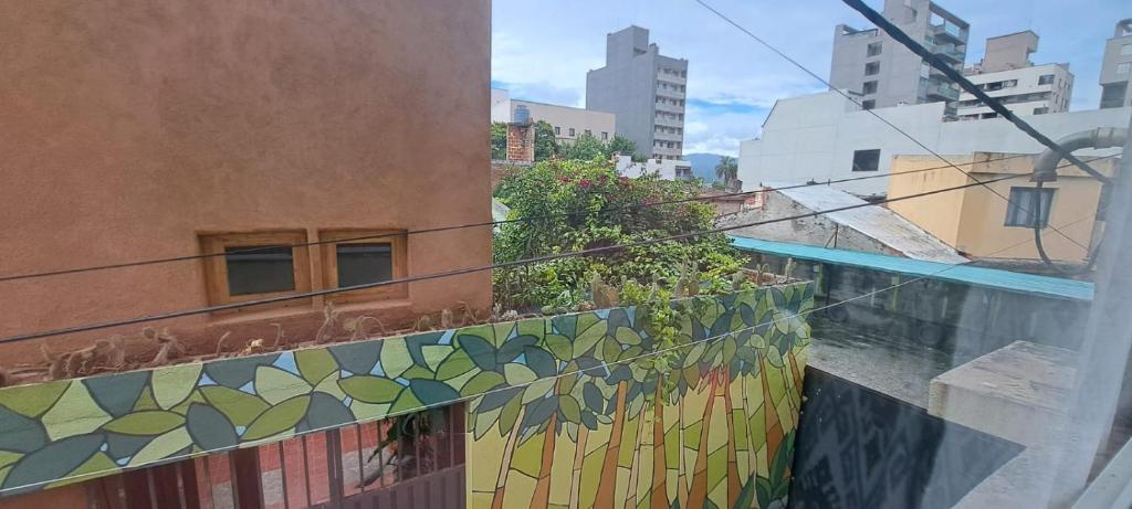 a view from a window of a building with mosaics at Alto Bustamante in San Salvador de Jujuy