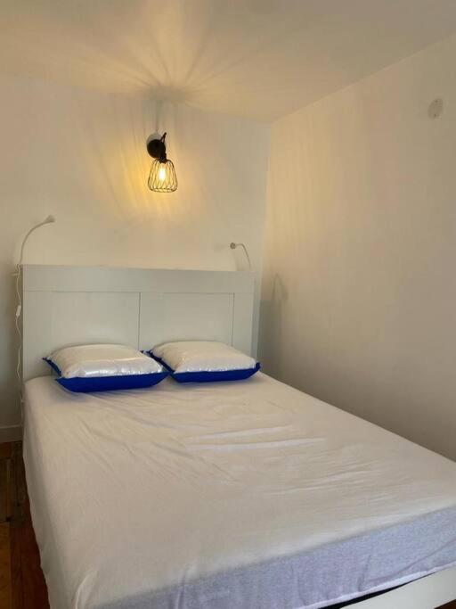 Postel nebo postele na pokoji v ubytování Gîte de La baleine