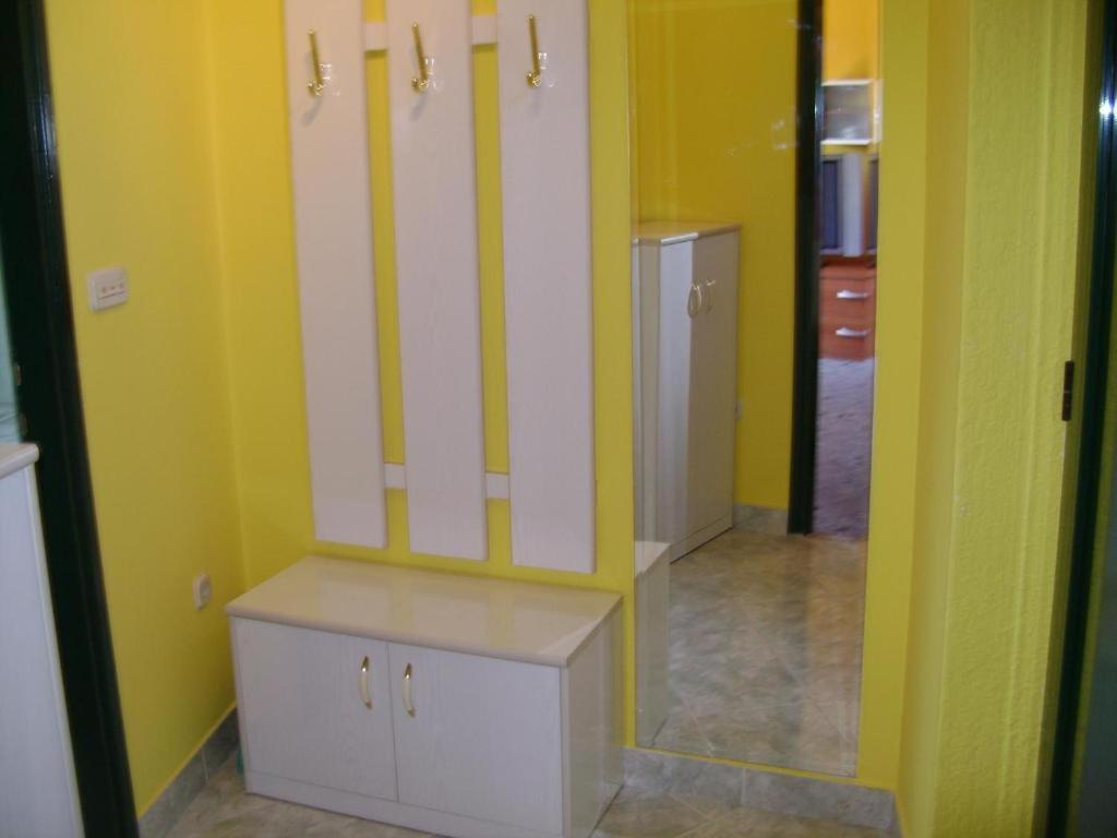 Kuchyň nebo kuchyňský kout v ubytování Apartmani Tome
