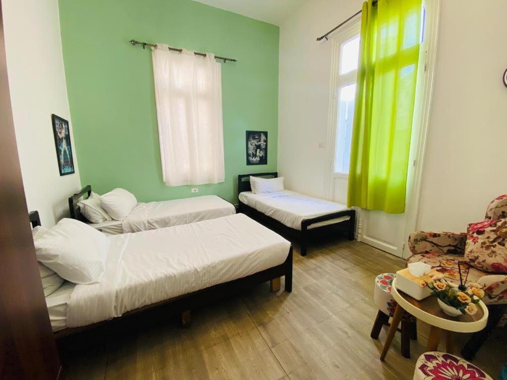 Postel nebo postele na pokoji v ubytování City Hostel Dormitory