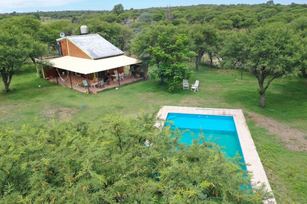 A view of the pool at Cabaña Los Puquios or nearby