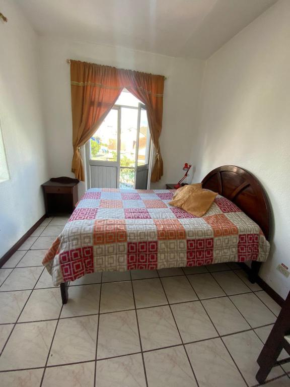 Postel nebo postele na pokoji v ubytování Hostal Almagro