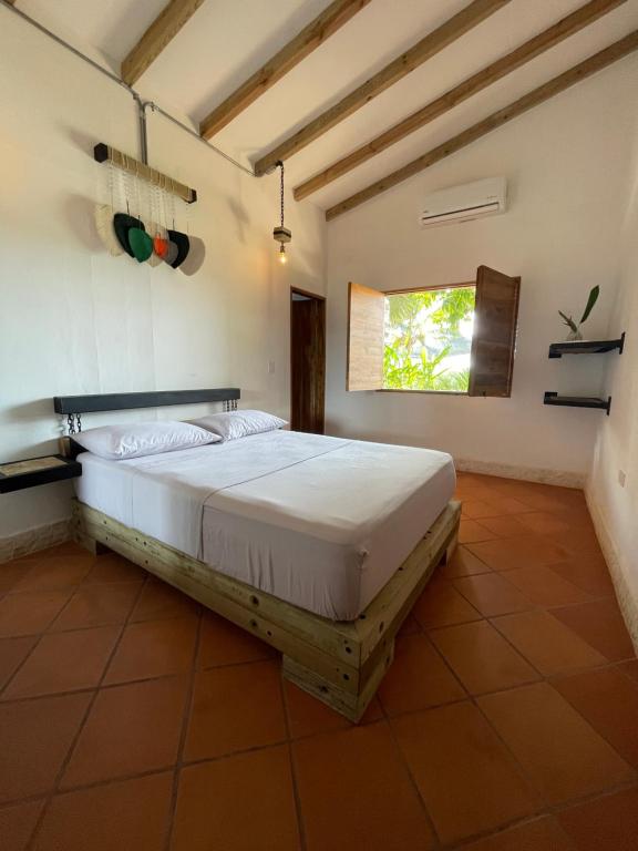 Postel nebo postele na pokoji v ubytování Finca Hotel el Valhalla